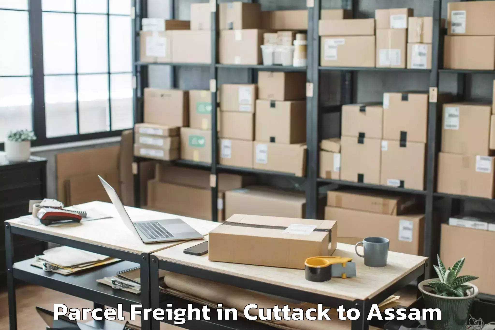 Book Cuttack to Sualkuchi Parcel Freight